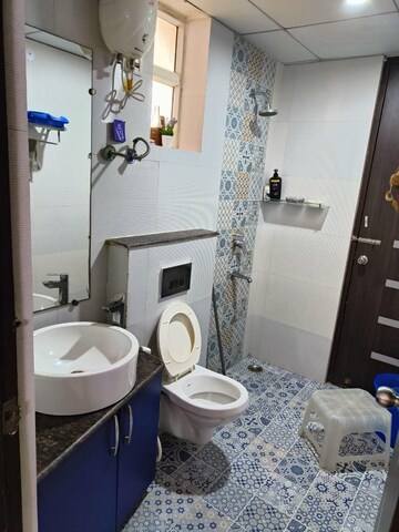 Bathroom in 3 BHK Apartment at Gaur Sportswood, Sector 79 – for Rent