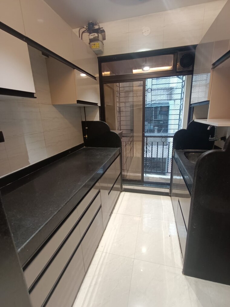 Kitchen, suncity-shrushti 2 Bedroom 1200 Sq.Ft. Apartment In Seawoods Navi Mumbai 8302441