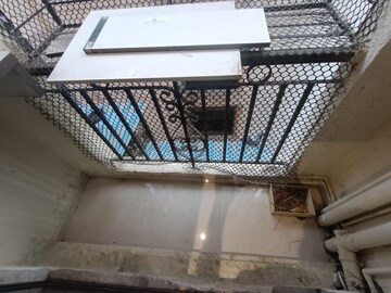Staircase in 2 BHK Apartment at Suncity Shrushti, Seawoods – for Sale