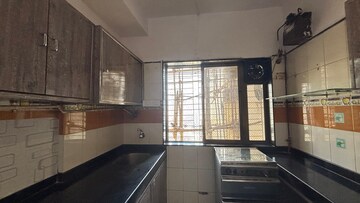 Kitchen in 4 BHK Apartment at Rajvilas Hawa Mahal Chs, Manpada – for Rent