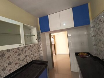 Kitchen in 2 BHK Apartment at Rustomjee Global City – for Sale