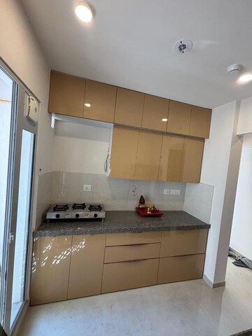 Kitchen in 2 BHK Apartment at Piramal Vaikunth, Balkum Pada – for Rent