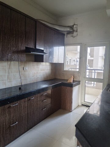 Kitchen in 2.5 BHK Apartment at AWHO Shanti Vihar, Sector 95 – for Rent