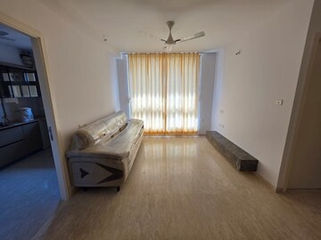 Living Room in 2 BHK Apartment at Hiranandani Delanna, Ghodbunder Road – for Rent