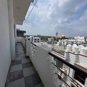 Balcony in 2 BHK Apartment at Palm Residency Chhatarpur, Rajpur Khurd Extension – for Rent