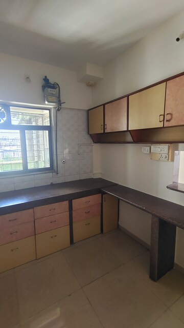 Kitchen in 2 BHK Apartment at Jasmine Tower, Vasant Vihar – for Rent