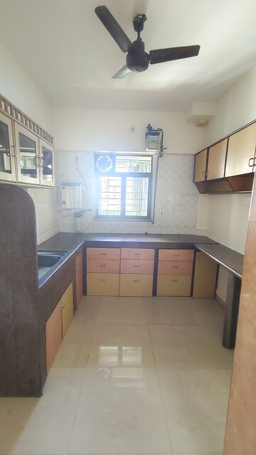 Kitchen in 2 BHK Apartment at Jasmine Tower, Vasant Vihar – for Rent
