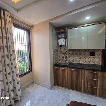 Living Room in 1 BHK Apartment at Palm Residency Chhatarpur, Rajpur Khurd Extension – for Rent