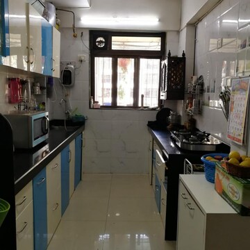 Kitchen in 2 BHK Apartment at Orchids CHS, Marol – for Sale