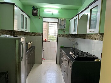 Kitchen in 1 BHK Apartment at Hiranandani Estate Penrith, Ghodbunder Road – for Rent