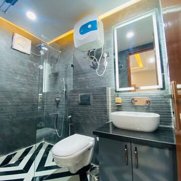 Bathroom in 1 BHK Apartment at Palm Residency Chhatarpur, Rajpur Khurd Extension – for Rent