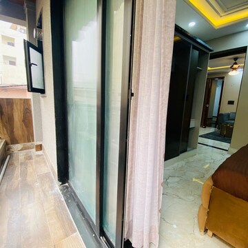 Balcony in 1 BHK Apartment at Palm Residency Chhatarpur, Rajpur Khurd Extension – for Rent