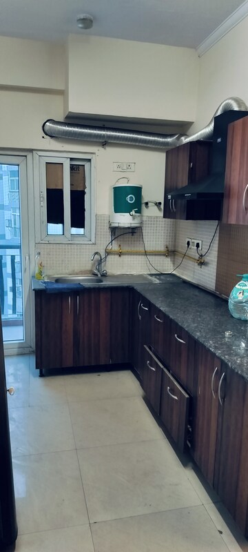 Kitchen in 3 BHK Apartment at Antriksh Golf View, Sector 78 – for Rent