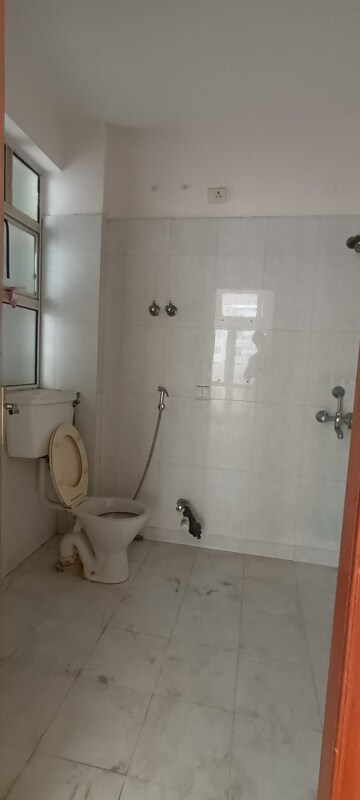 Bathroom in 4 BHK Apartment at Ramprastha Pearl Heights, Vaishali Sector 9 – for Rent