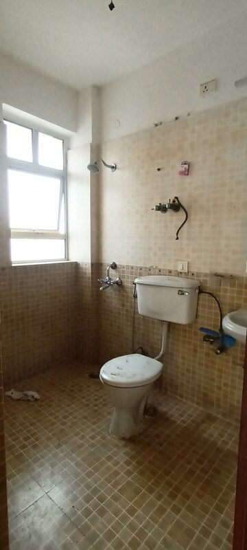 Bathroom in 4 BHK Apartment at Ramprastha Pearl Heights, Vaishali Sector 9 – for Rent