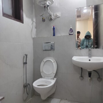 Bathroom in 2 BHK Apartment at Palm Residency Chhatarpur, Rajpur Khurd Extension – for Rent