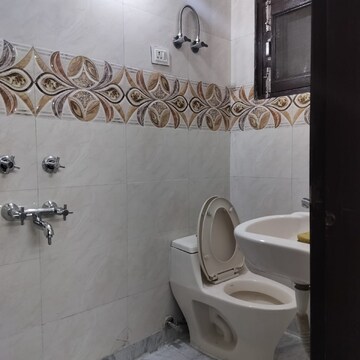 Bathroom in 2 BHK Apartment at Palm Residency Chhatarpur, Rajpur Khurd Extension – for Rent