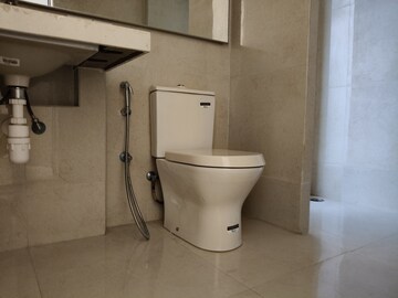 Bathroom in 2 BHK Apartment at Rodas Enclave Woodstock, Patlipada – for Rent