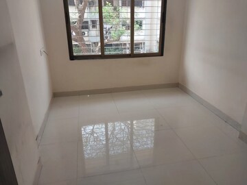 Room in 2 BHK Apartment at Spark Mogra Vikas Chs, Andheri East – for Rent