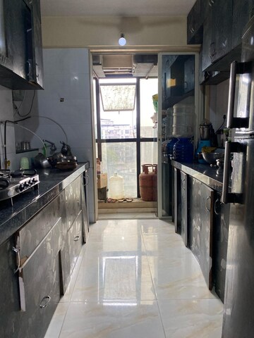 Kitchen in 2 BHK Apartment at Raj Antila, Mira Road – for Sale