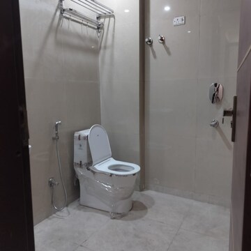 Bathroom in 2 BHK Apartment at Palm Residency Chhatarpur, Rajpur Khurd Extension – for Rent