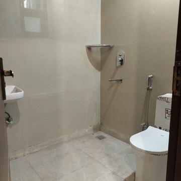 Bathroom in 2 BHK Apartment at Palm Residency Chhatarpur, Rajpur Khurd Extension – for Rent