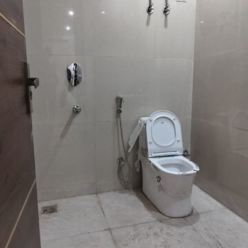 Bathroom in 2 BHK Apartment at Palm Residency Chhatarpur, Rajpur Khurd Extension – for Rent