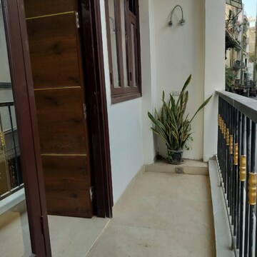Balcony in 2 BHK Apartment at Palm Residency Chhatarpur, Rajpur Khurd Extension – for Rent
