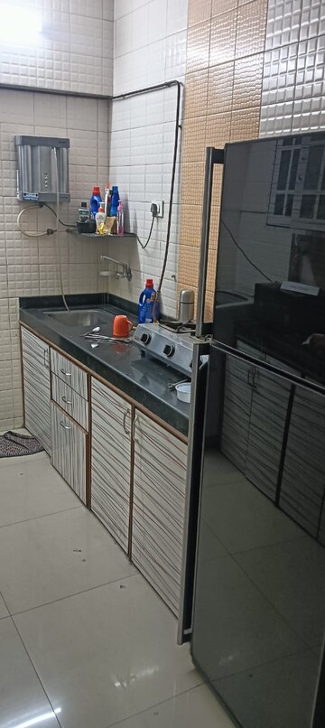 Kitchen in 2 BHK Apartment at Raj Paradise B Wing CHS Ltd, Andheri East – for Rent