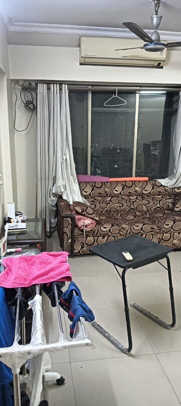 Living Room in 2 BHK Apartment at Raj Paradise B Wing CHS Ltd, Andheri East – for Rent