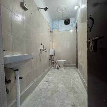 Bathroom in 2 BHK Apartment at Palm Residency Chhatarpur, Rajpur Khurd Extension – for Rent
