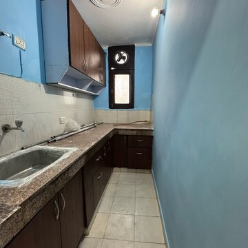 Kitchen in 2 BHK Apartment at Palm Residency Chhatarpur, Rajpur Khurd Extension – for Rent