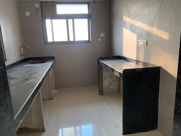 Kitchen in 2 BHK Apartment at Shree Abhishek CHS, Kandivali West – for Sale