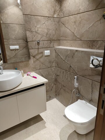 Bathroom in 4 BHK Builder Floor at Green Park Extension – for Sale