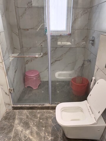 Bathroom in 4 BHK Builder Floor at Green Park Extension – for Sale
