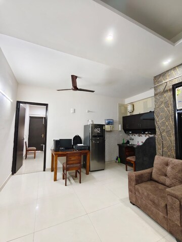 Living Room in 2 BHK Builder Floor at Ansal Sushant Apartments, Sushant Lok I – for Rent