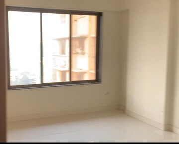 Room in 2 BHK Apartment at Shree Abhishek CHS, Kandivali West – for Sale
