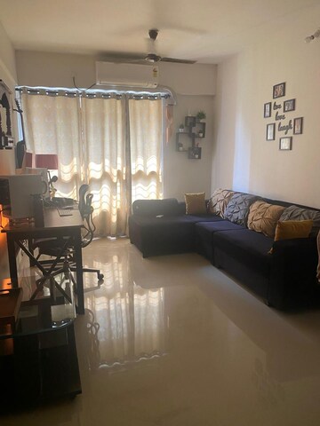 Living Room in 1 BHK Apartment at Puranik Hometown, Ghodbunder Road – for Sale