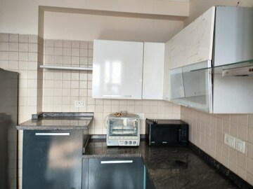 Kitchen in 4 BHK Apartment at Parsvnath Exotica, Sector 53 – for Rent