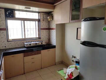 Kitchen in 1 BHK Apartment at Happy Valley, Manpada – for Rent