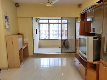 Living Room in 1 BHK Apartment at Happy Valley, Manpada – for Rent
