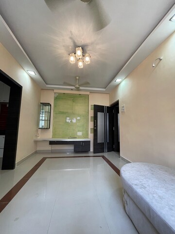 Living Room in 2 BHK Apartment at Versova Heights, Versova – for Rent