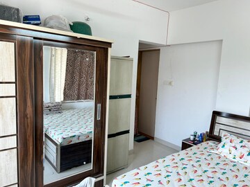Bedroom in 2 BHK Apartment at Suvarna Apartment, Kothrud – for Sale