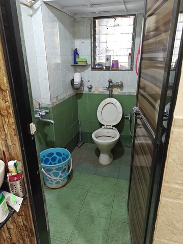 Bathroom in 1 BHK Apartment at Nilgiri C Wing CHS, Andheri East – for Rent