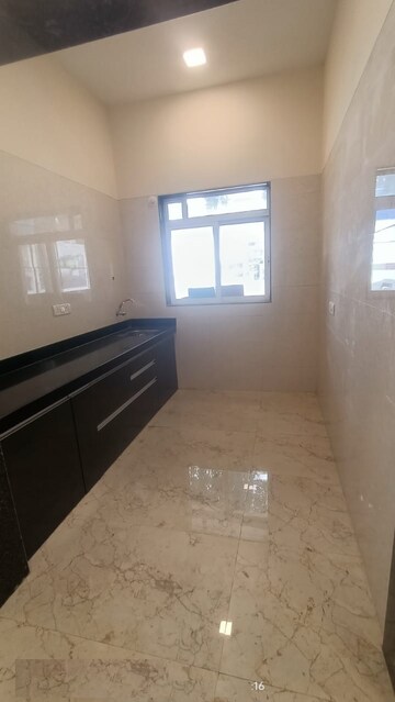 Kitchen in 2 BHK Apartment at SK Imperial Garden, Mira Road – for Sale