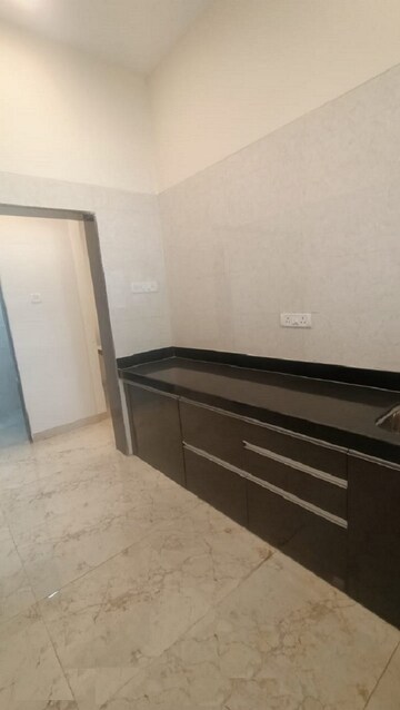Kitchen in 3 BHK Apartment at SK Imperial Garden, Mira Road – for Sale