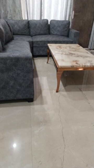 Living Room in 2 BHK Apartment at Maple Heights, Sector 43 – for Rent