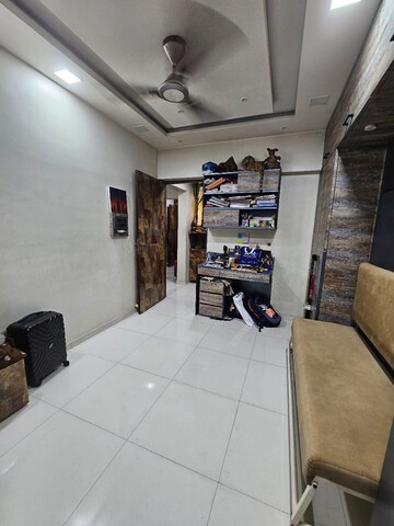 Living Room in 2 BHK Apartment at Acme Ozone, Manpada – for Sale