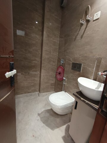 Bathroom in 2.5 BHK Apartment at Paschim Vihar – for Rent
