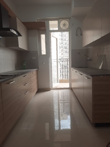 Kitchen in 2 BHK Apartment at Amrapali Golf Homes, Sector 4, Greater Noida – for Sale